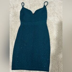 Dark green dress, has sparkles on it
